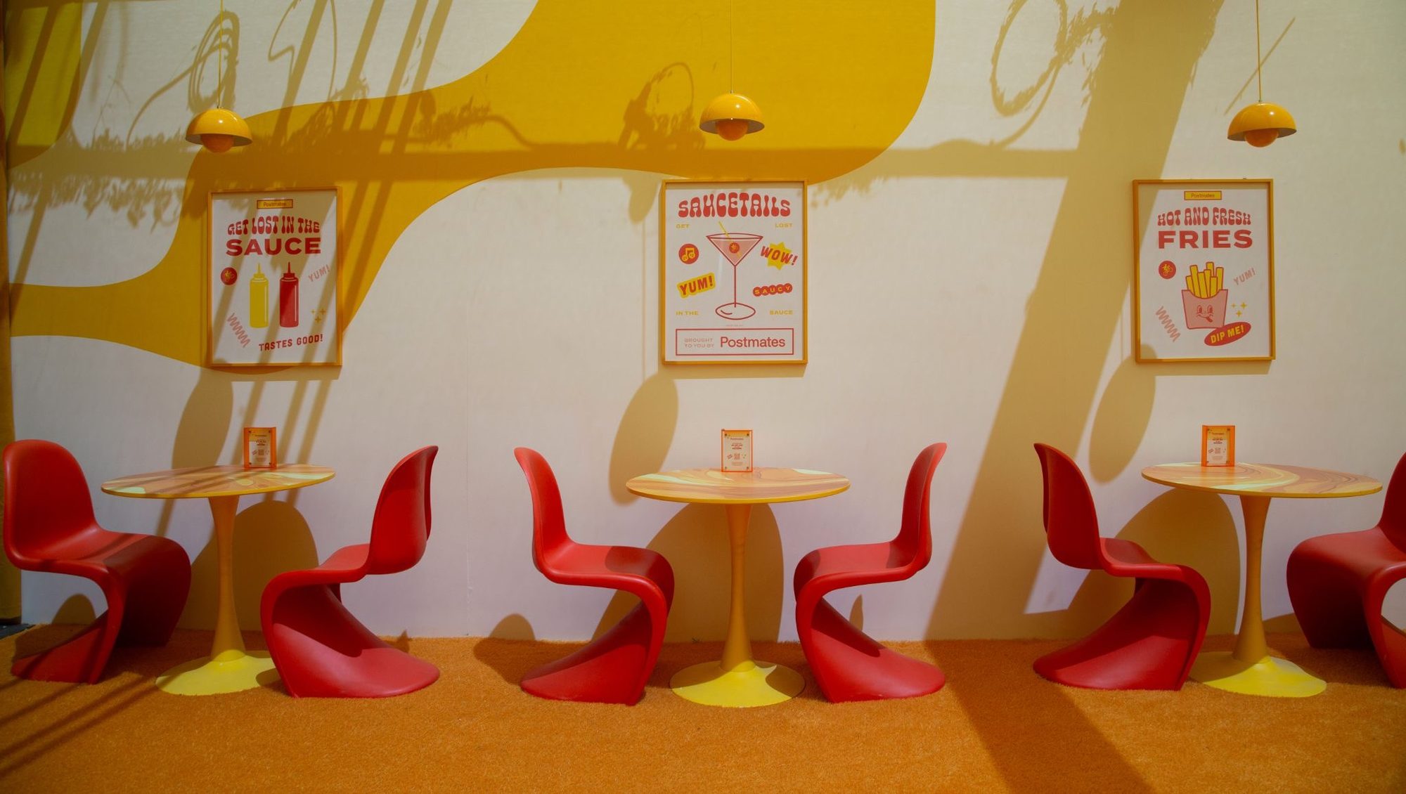 Sauce Bar seating and posters